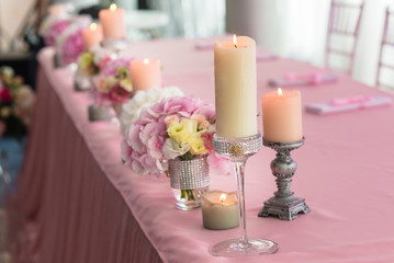 Wedding stylish decor elements in banquet hall closeup