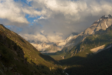 Russia, Republic of Kabardino-Balkaria, time lapse. Summer in the mountains of the Caucasus. Formation and movement of clouds over mountains peaks.