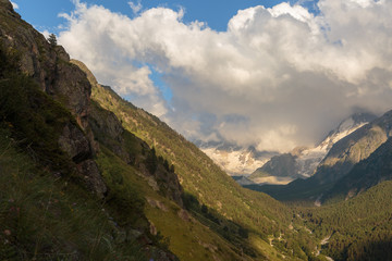 Naklejka premium Russia, Republic of Kabardino-Balkaria, time lapse. Summer in the mountains of the Caucasus. Formation and movement of clouds over mountains peaks.