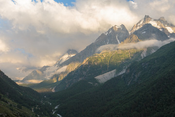 Russia, Republic of Kabardino-Balkaria, time lapse. Summer in the mountains of the Caucasus. Formation and movement of clouds over mountains peaks.