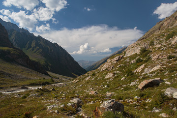 Fototapeta premium Russia, Republic of Kabardino-Balkaria, time lapse. Summer in the mountains of the Caucasus. Formation and movement of clouds over mountains peaks.