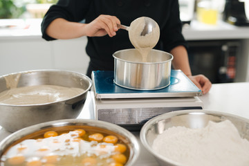 Bakery chef cooking bake in the kitchen professional