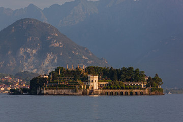 Scenic view of Isola Bella island on the mountains background on Lake Maggiore in the morning, Italy
