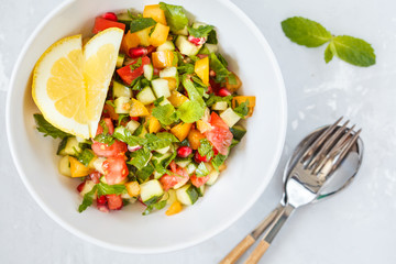 salad tabbouleh, rustic concrete background