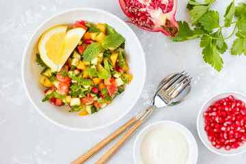 salad tabbouleh, rustic concrete background