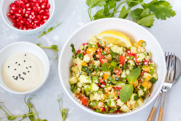 salad tabbouleh, rustic concrete background