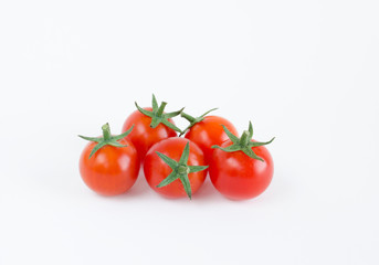 Cherry tomatoes on white background.