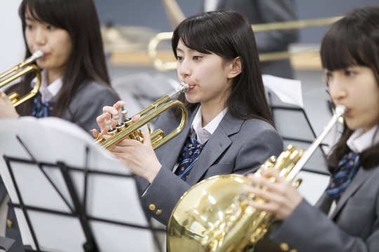 Students playing brass instruments