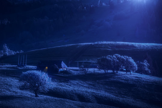 Carpathian village hills in a moonlight