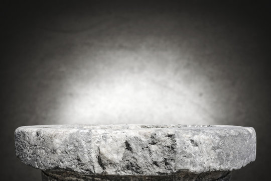 rock table background and gray dark wall space 