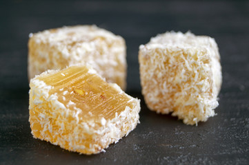 Turkish delight on black background.