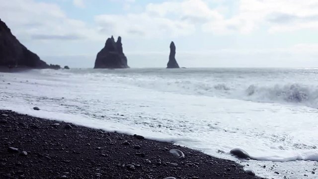 Iceland, surf on black beach. South coast, Vic