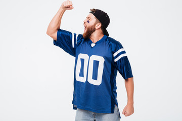 Naklejka premium Screaming man fan in blue t-shirt