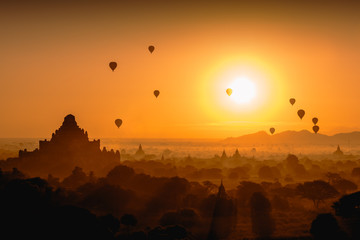 Beautiful sunrise and hot air balloons over ancient pagoda in Bagan is old kingdom in past, Myanmar