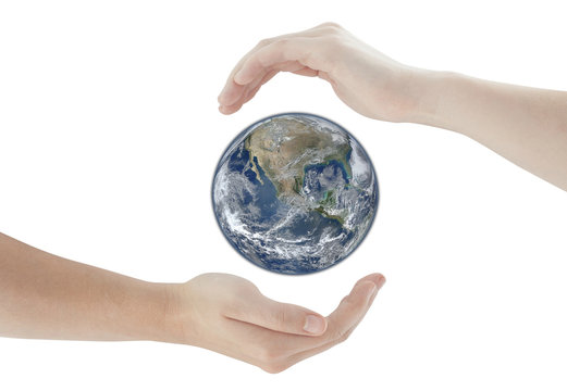 hands protecting Earth Globe. Elements of this image furnished by NASA