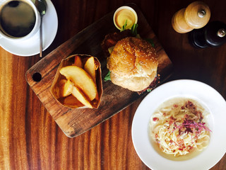Hamburger and Spaghetti carbonara with chips and coffee