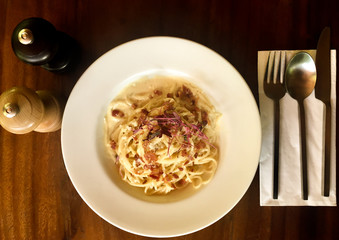 Carbonara with ham and cheese