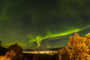 Aurora Borealis über Leuchtturm in Tromsø