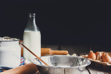 Ingredients for making dough - flour, milk, eggs