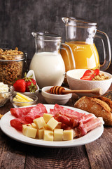 Breakfast served with coffee, orange juice, croissants, cereals