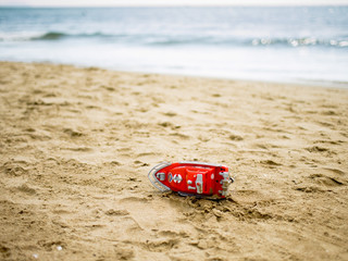 abandoned toys on the empty beach