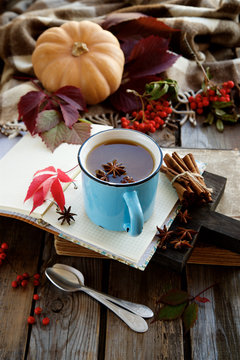 Warm coffee drink with spices and pumpkin. Pumpkin latte. Autumn still life 
