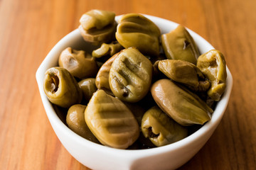 Grilled Green Olives in a bowl.