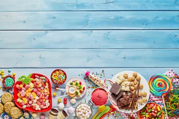 Gordijnen Table full of sweet food © exclusive-design