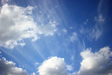 A view of the beautiful white clouds in the blue sky, in the morning, The sun, Fresh air.