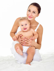 Mother and baby playing and smiling. Happy family. Isolated,