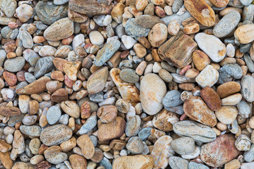 Close up dry round reeble stones background