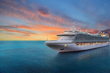 Tuinposter Luxury cruise ship sailing to port on sunrise  © NAN