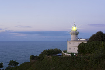 Fototapeta na wymiar Light for navigation, lighthouse in San Sebastian, Basque Country