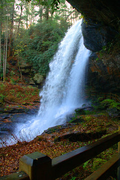 behind waterfalls