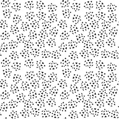 Seamless abstract pattern background with hand drawn doodle geometric figures triangles on white