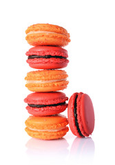 French dessert. Sweet red and orange macaroons or macarons