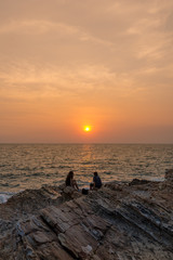 two people sea sunset at the sea
