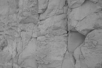 details of a natural stone wall on a beach