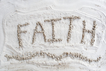 Faith Hand Written in Beach Sand