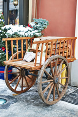Decorative wooden wagon with letters to Santa Claus.Christmas exterior cafe.Decorations for Christmas on the streets of European cities.