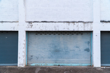 Garage Steel door and floor mortar.