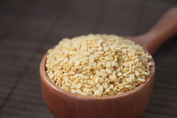 Indian Husked Green Gram with Wooden Scoop