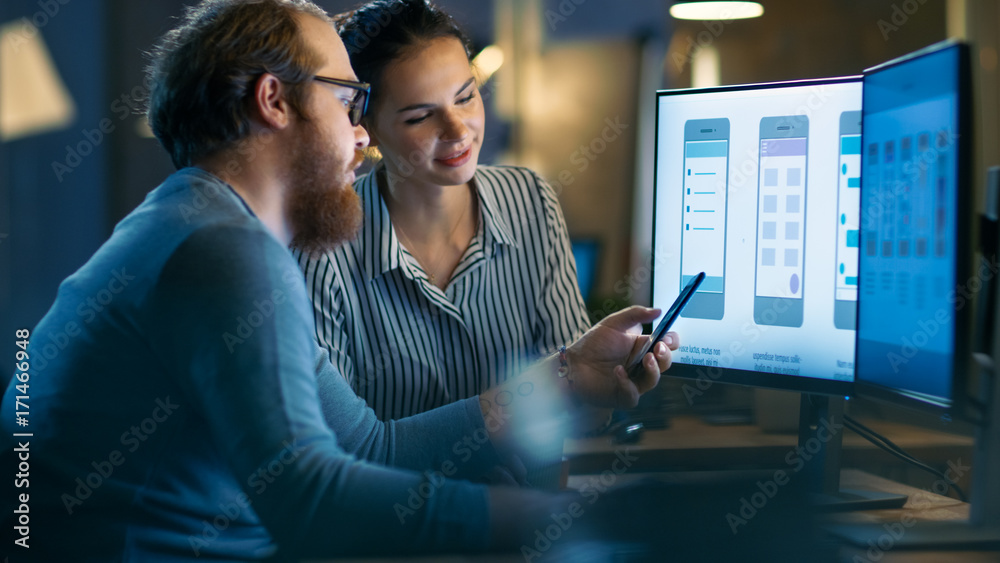 Poster handsome male and beautiful female mobile application designers test and discuss new app features. t