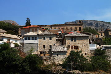 Fototapeta na wymiar Stone buildings near famous Old bridge in Mostar , Bosnia and Herzegovina
