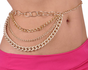 necklace on the naked waist of a girl on a white background