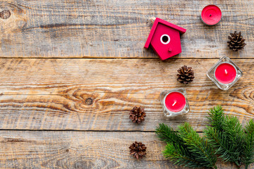 new year 2018 greeting with spruce branches and house decorations on wooden background top veiw space for text