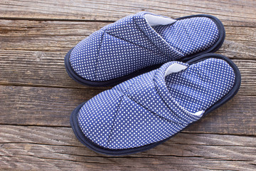 House slippers on old wooden floor