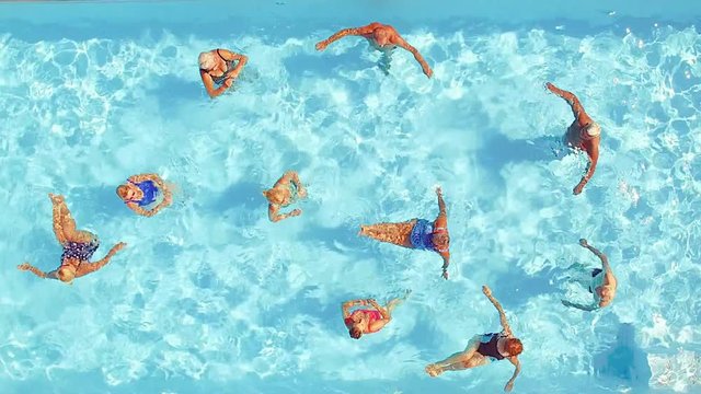 Group of seniors swimming in a pool