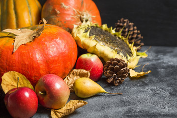 Autumn background from fallen leaves and fruits. Thanksgiving day concept