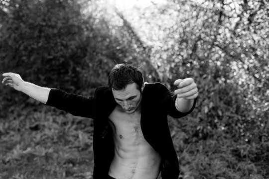 People dancing in the forest